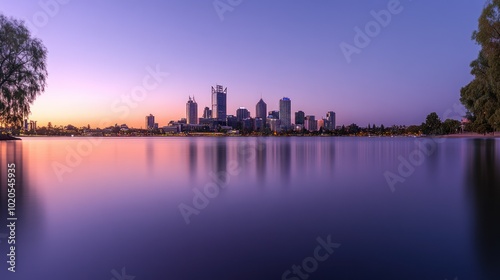 Perth City Skyline Reflected in Still Water at Sunset