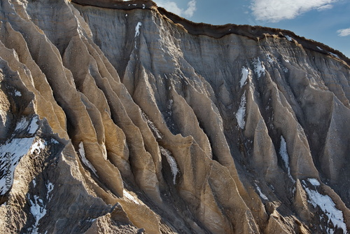 Russia, the Far East, the Kuril Islands. One of the main attractions of Iturup Island is the destructive pumice mountains on the coast of the Sea of Okhotsk. photo