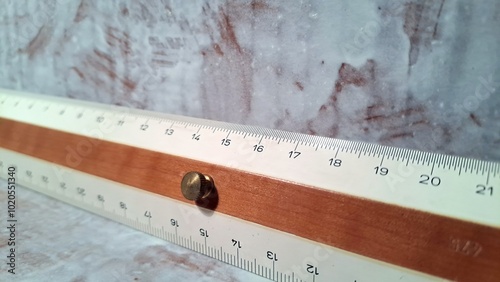 Wooden ruler 30 centimeters vintage with close-up and copy space