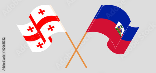 Crossed and waving flags of Georgia and Republic of Haiti. Vector illustration