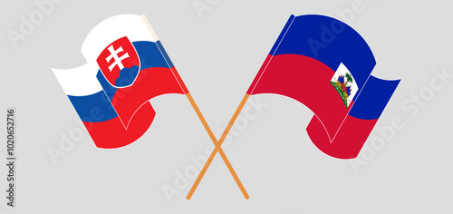 Photography Crossed and waving flags of Slovakia and Republic of Haiti