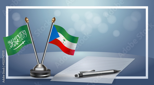 Saudi Arabia and Equatorial Guinea Small national flag on bokeh background, cooperative relationship