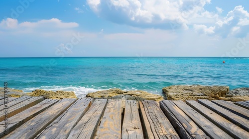 Calm sea horizon view from a weathered wooden platform, evoking tranquility