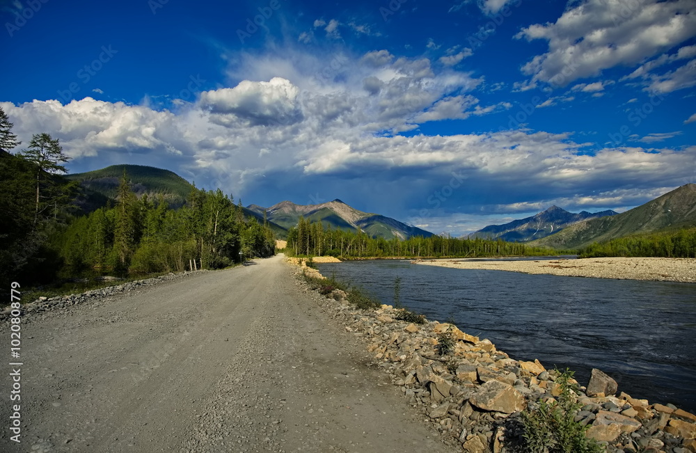 Road along the Nera River in the Republic of Sakha Yakutia. Road along the Nera River in the Republic of Sakha Yakutia.