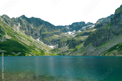 A beautiful mountain lake surrounded by rocks. Czarny Staw Gasienicowy. Isolated object. photo
