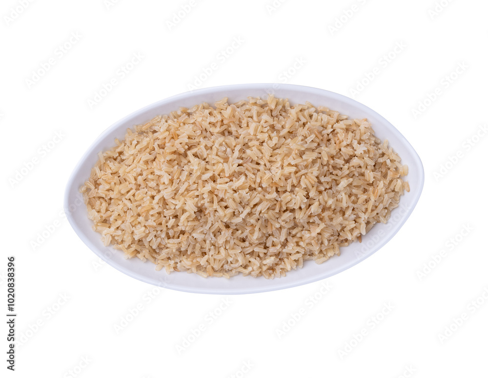 Cooked brown whole rice in a plate isolated over white background Cooked brown whole rice in a plate isolated over white background