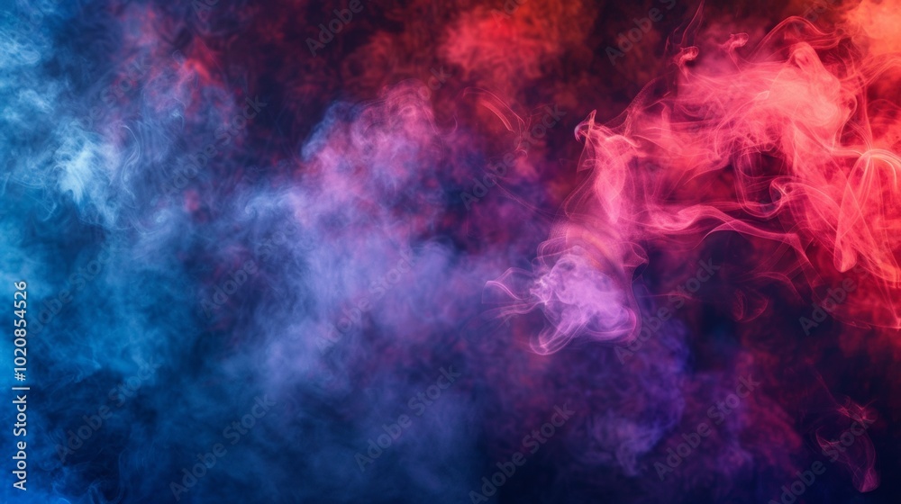Fototapeta premium Dramatic smoke and fog in contrasting vivid red, blue, and purple colors. Vivid and intense abstract background or wallpaper.