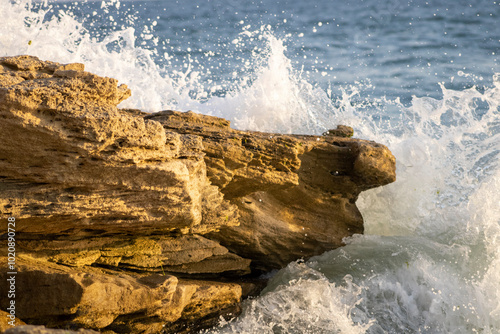 waves crashing on rocks
