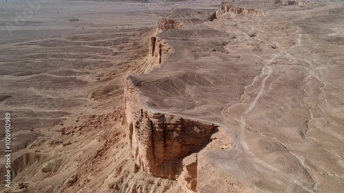 Camera drone ascends above Edge of the World, a popular tourist destination near Riyadh