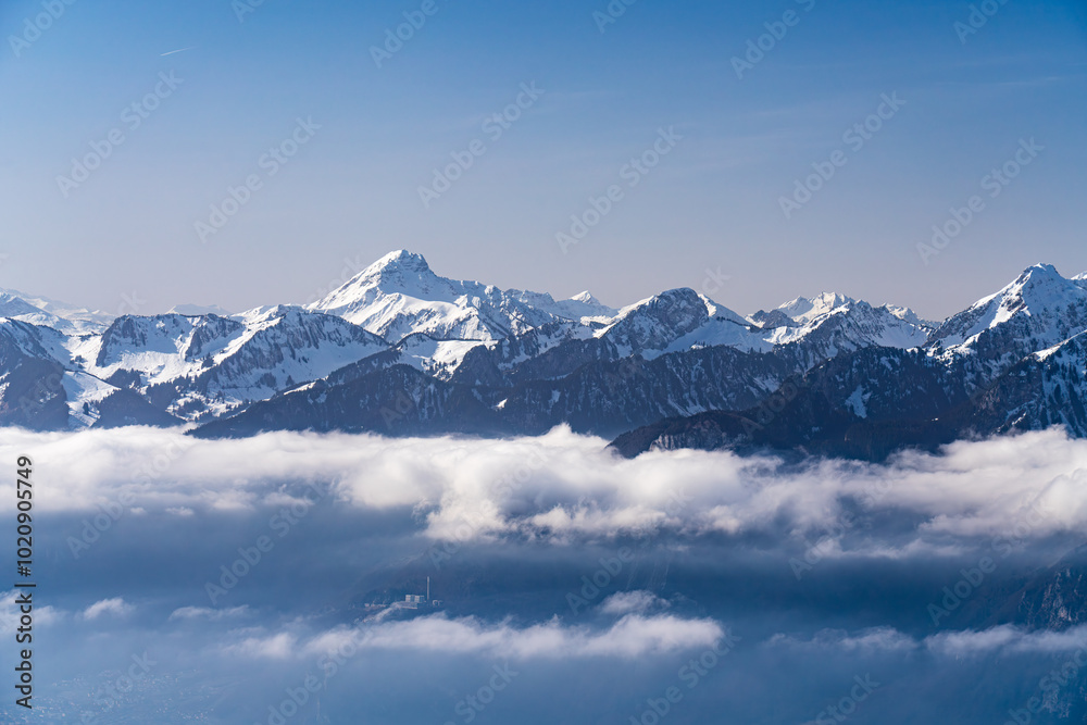Obraz premium View on winter mpuntains from Rochers-de-Naye peak, Montreux, Alps.