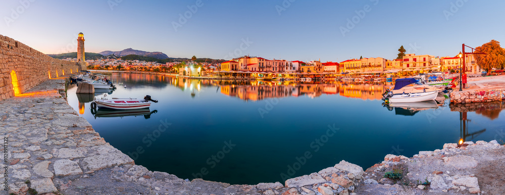 Rethymno, Crete - Greece. Morning view of the old venetian harbor and Venetian Fortezza Castle.