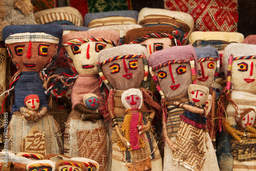 These handmade dolls aren’t just toys; they’re crafted with love, imagination, and unique charm! Each doll has its own personality, making it a one-of-a-kind friend.  Pisac Cusco Peru. photo