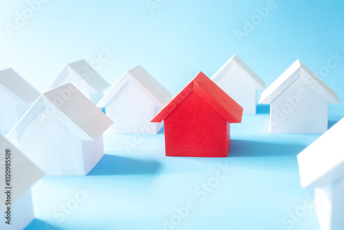 Real estate property red paper house on blue background