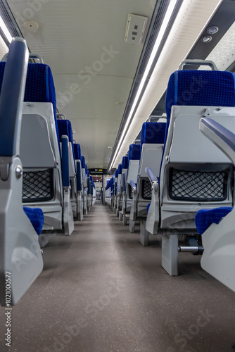 Passenger Coaches with Vacant Seat and Window View During Daytime of high speed Train photo