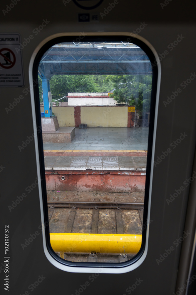 Fototapeta premium Passenger Train Door Window View During Daytime