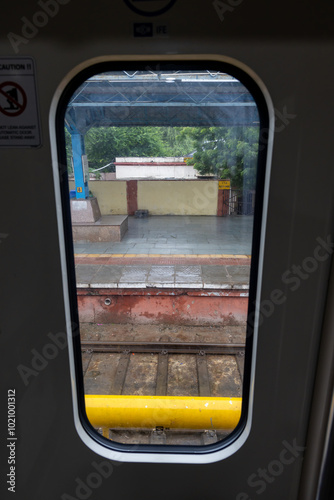 Passenger Train Door Window View During Daytime photo