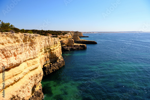 characteristic and suggestive rocky stretch between praia das fontainhas and praia de albandeira lagoa portugal photo