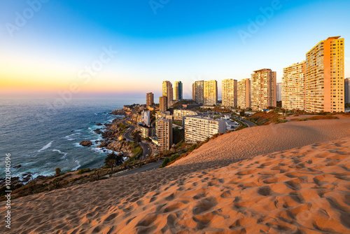 Fototapeta Naklejka Na Ścianę i Meble -  View of buildings in Concon from the sand dunes, Valparaiso Region, Chile