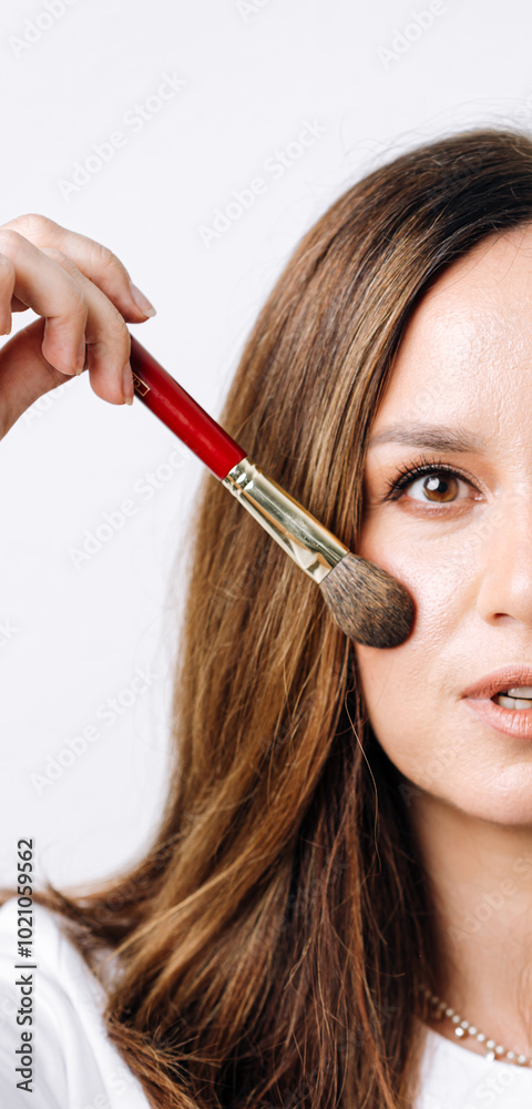 portrait of makeup artist on white background