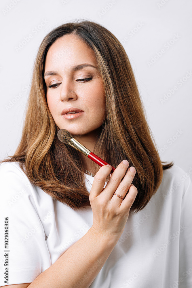 portrait of makeup artist on white background