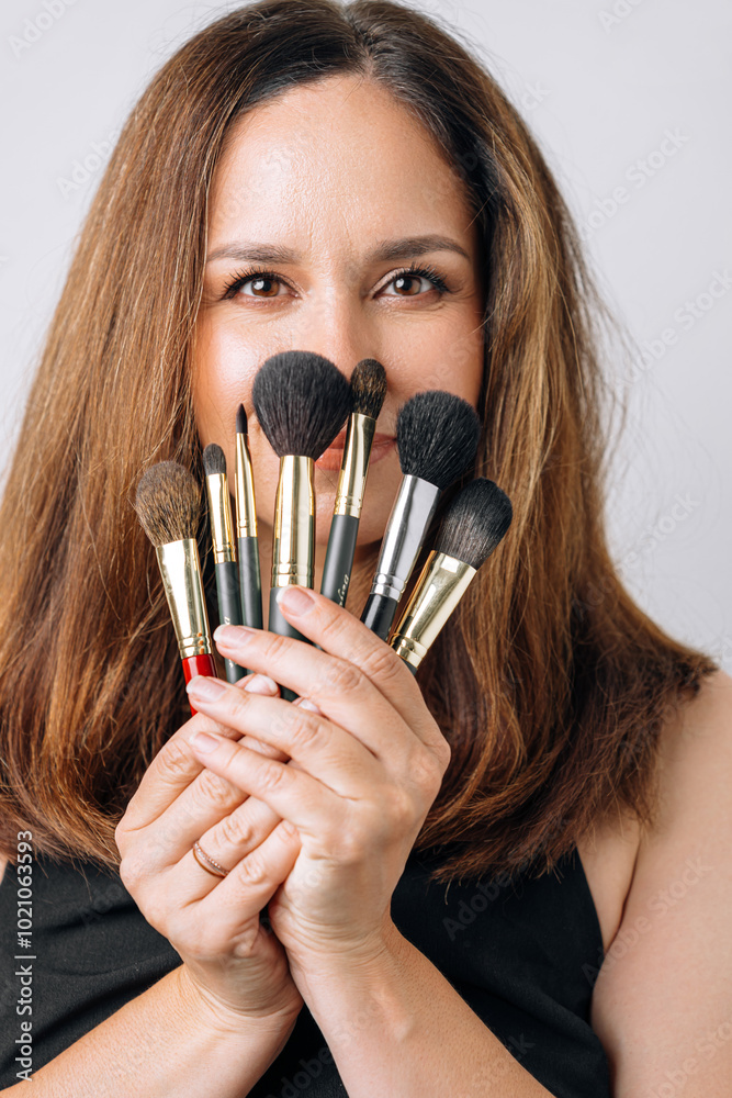 portrait of makeup artist on white background