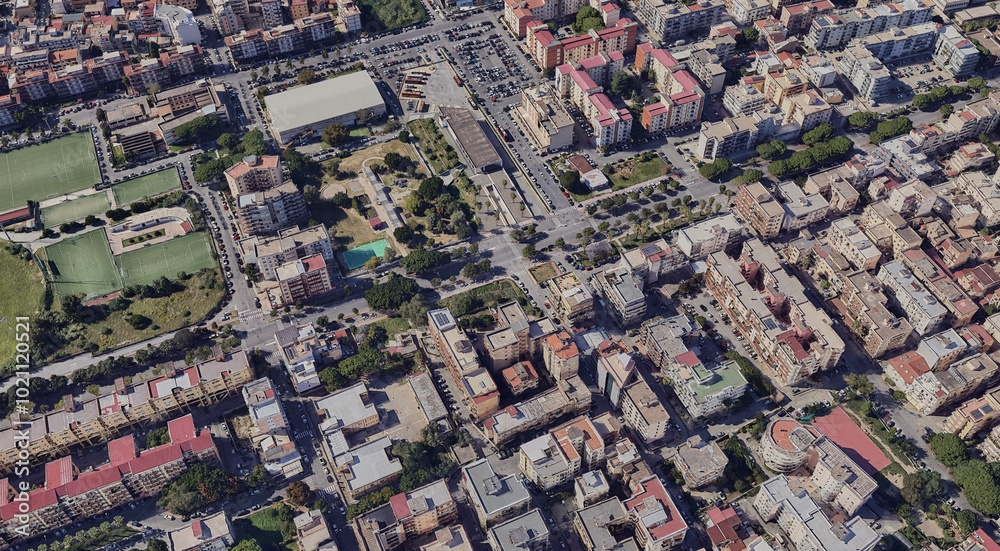 Obraz premium Reggio Calabria's Coastline from Above: Ionian Sea and Urban Landscape