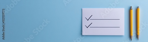 A clean workspace featuring a checklist with checkmarks and yellow pens, perfect for organization and productivity