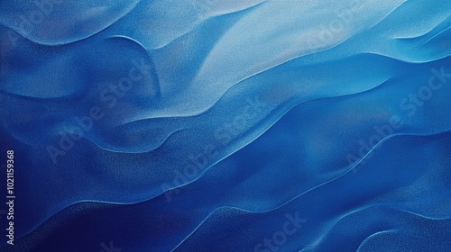 Abstract waves of blue, creating a serene and calming atmosphere.