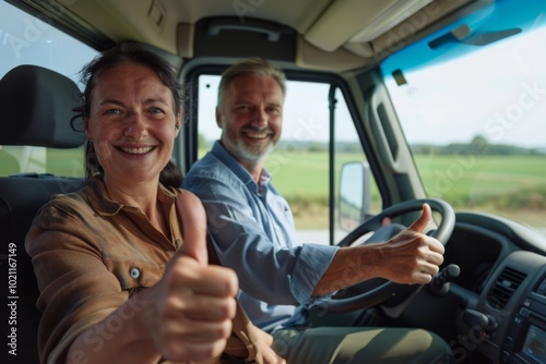 Happy European spouses sitting in new car and gesturing thumbs up, smiling at camera, driving new auto during test drive. Auto leasing concept photo