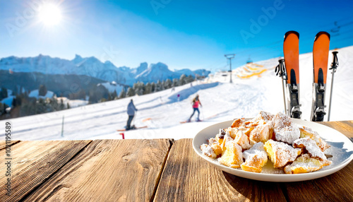 Im Vordergrund eine Portion Kaiserschmarren, im Hintergrund ein Skigebiet im Winter traumhaftes Bergpanorama photo