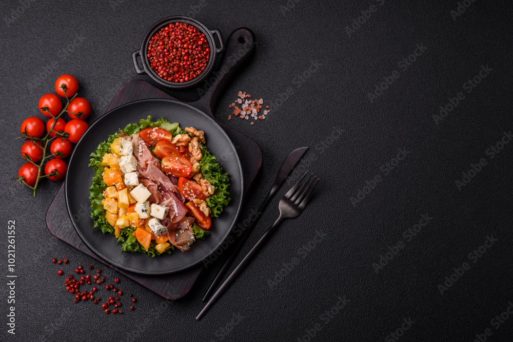 Appetizing salad with prosciutto, pumpkin, cheese and tomatoes Appetizing salad with prosciutto, pumpkin, cheese and tomatoes