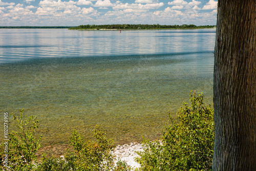 The clouds build on the horizon of Green Bay, looking west from Peninsula State Park, Fish Creek, Door County, Wisconsin in early June.