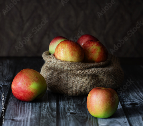 apples on wooden table