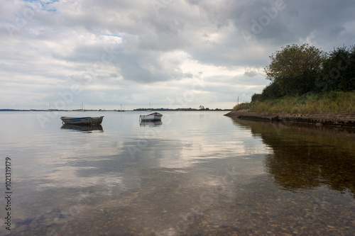 Boats moored in Chichester Harbour, England. Prinstead.