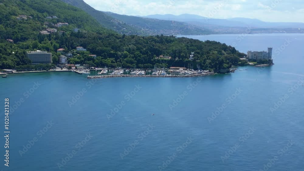 The Gulf of Trieste, its high cliffs and the Miramare Castle The Gulf of Trieste, its high cliffs and the Miramare Castle