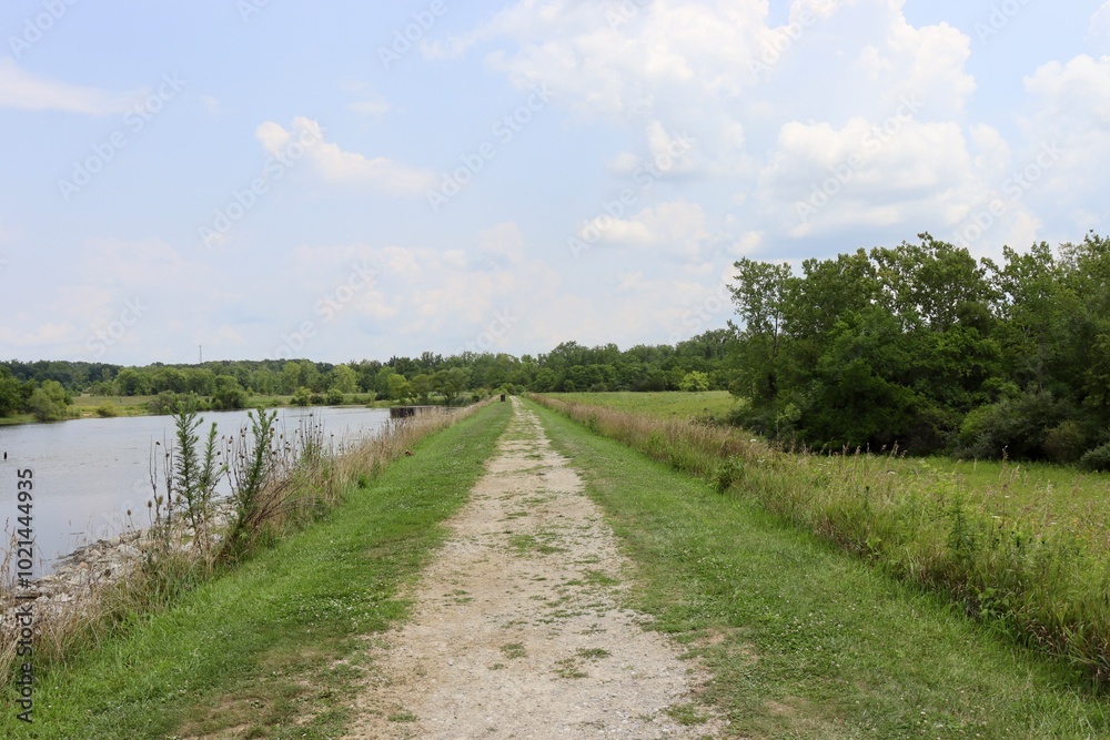 The long trail in the country field on a sunny day. The long trail in the country field on a sunny day.