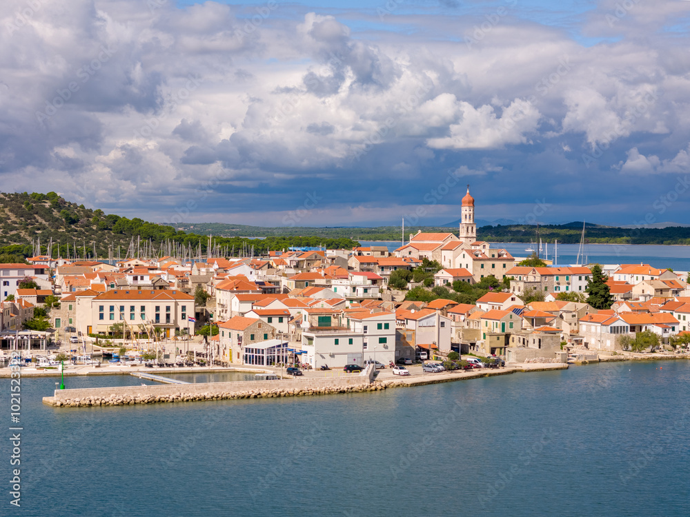 Aerial drone photo of the coastal town of Betina on the island of Murter in Croatia. Aerial drone photo of the coastal town of Betina on the island of Murter in Croatia.