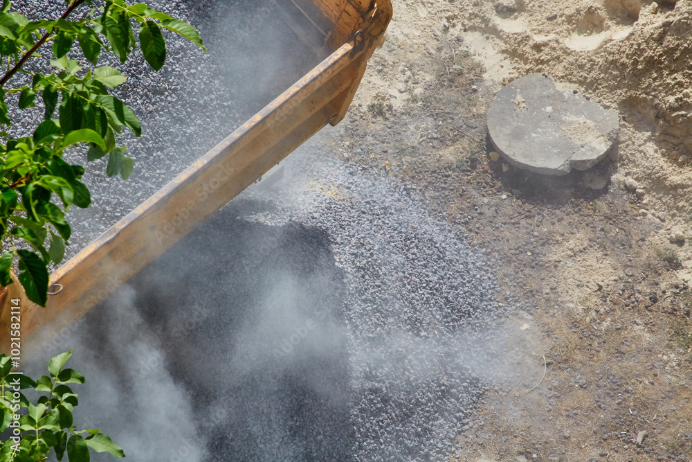 Ταπετσαρία The process of unloading construction crushed stone at a construction site - close-up shows crushed stone being dumped from a truck at a construction site