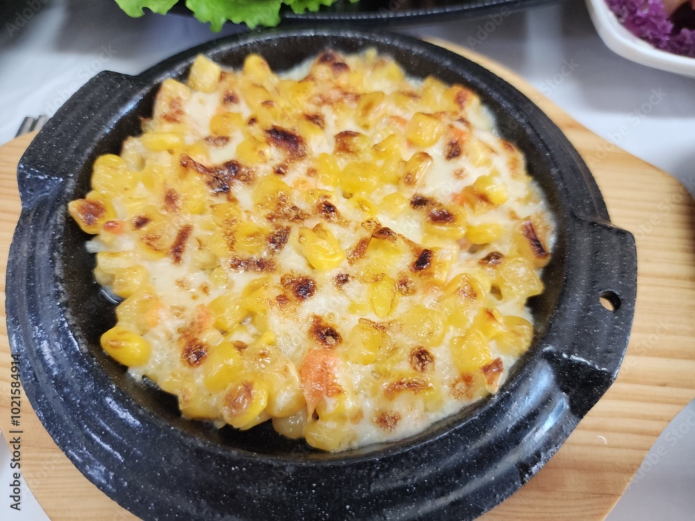 Korean sashimi restaurant side dishes. sweet corn cheese Korean sashimi restaurant side dishes. sweet corn cheese