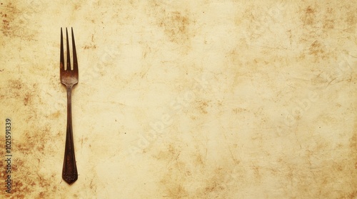 Beige background with a small fork on the left.