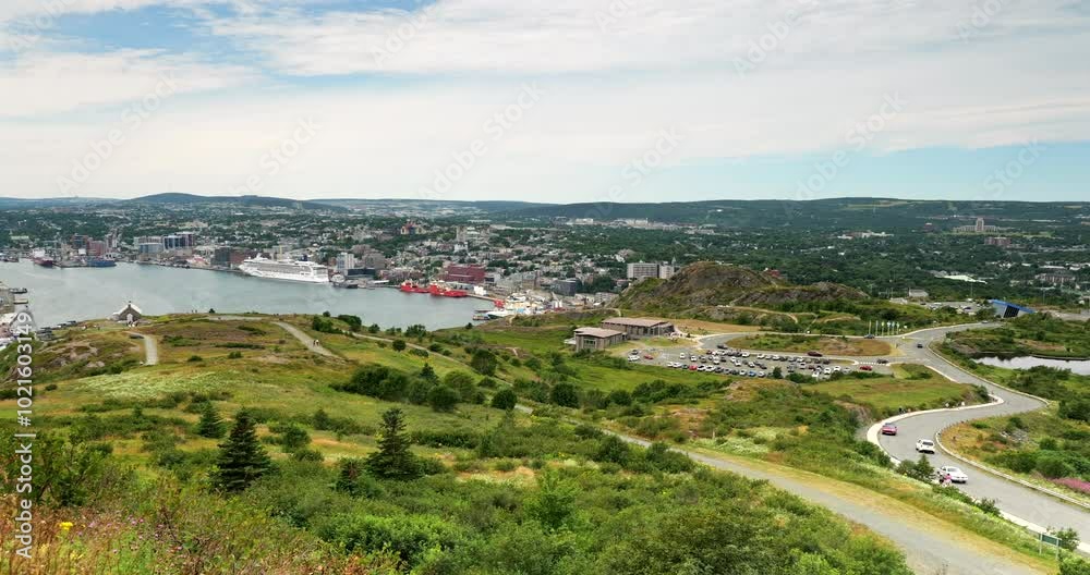 Scenic view of Signal Hill National Historic Site with cityscape of St. John's, Newfoundland, Canada, showcasing historic landmarks and rugged coastline. Scenic view of Signal Hill National Historic Site with cityscape of St. John's, Newfoundland, Canada, showcasing historic landmarks and rugged coastline.