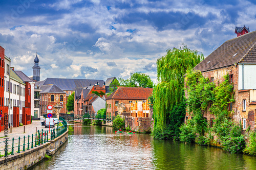 Ghent cityscape, embankment and old brick buildings on bank of Lieve water canal, Bridge Imperial Pleasures, water canal in Ghent city centre Prinsenhof Princes Court quarter, Gent old town, Belgium photo