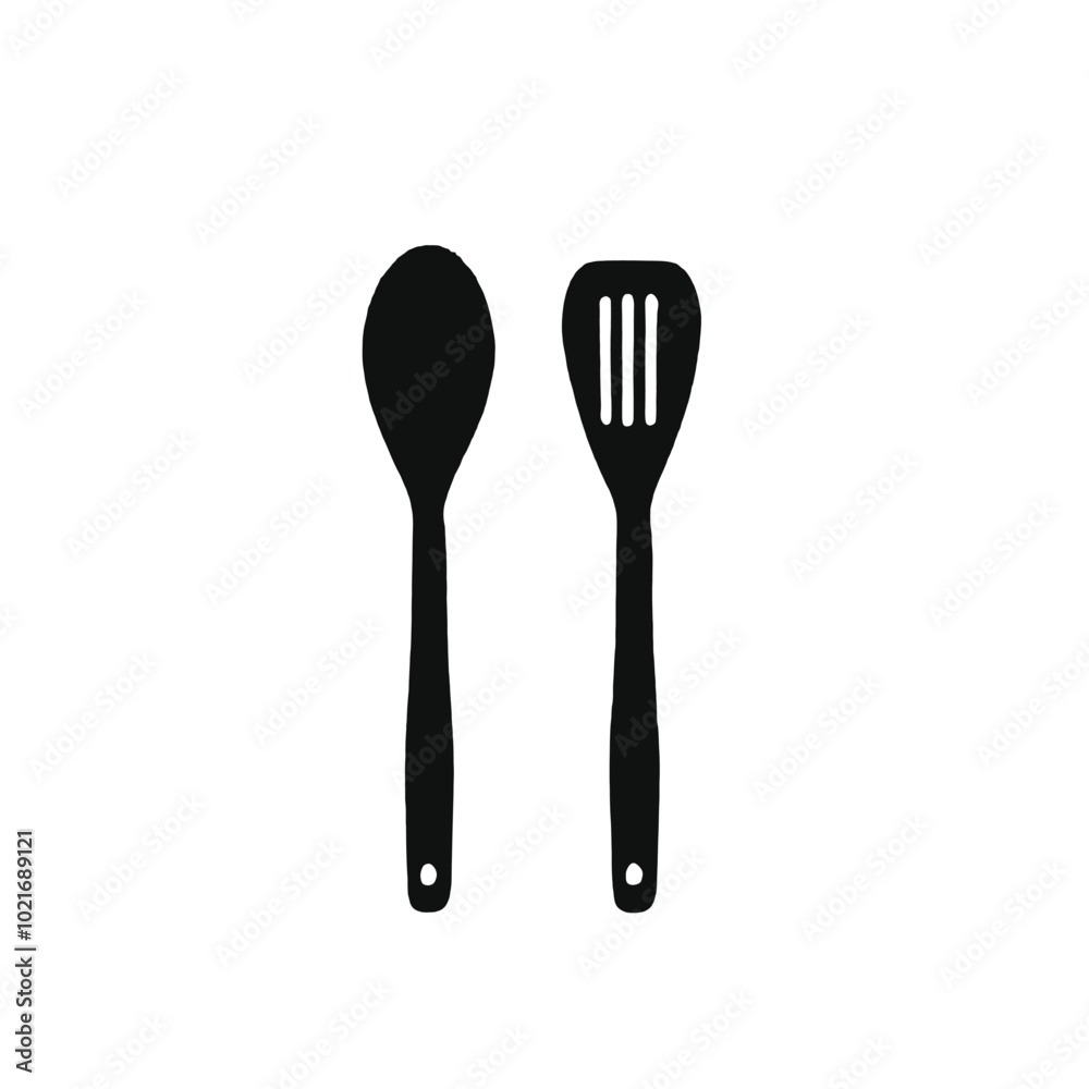 Two black kitchen utensils, a spatula and a slotted spoon, on a white background Two black kitchen utensils, a spatula and a slotted spoon, on a white background