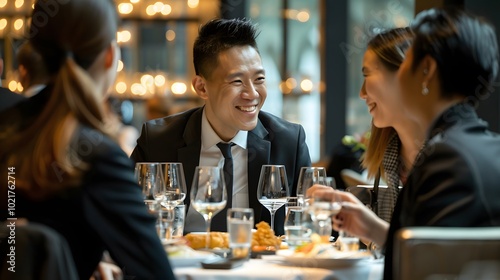 Professionals networking over dinner in refined setting