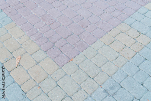 Mosaic Pavement with Soft Pastel Colors and Textured Surface