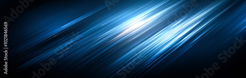Blue light streaks on dark backdrop. Bright blue streaks of light create a dynamic pattern against a dark background, evoking a sense of motion and energy.