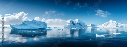 Panoramic view of Antarctica with icebergs floating in the ocean