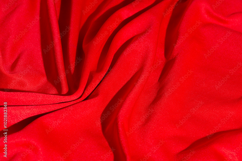 Obraz premium selective focus Luxurious fabric texture of red silk or wavy satin can be used as abstract background, top view