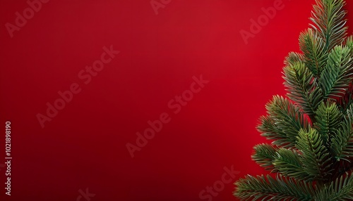 Christmas tree on a Red background with space for text, Christmas background with copy space