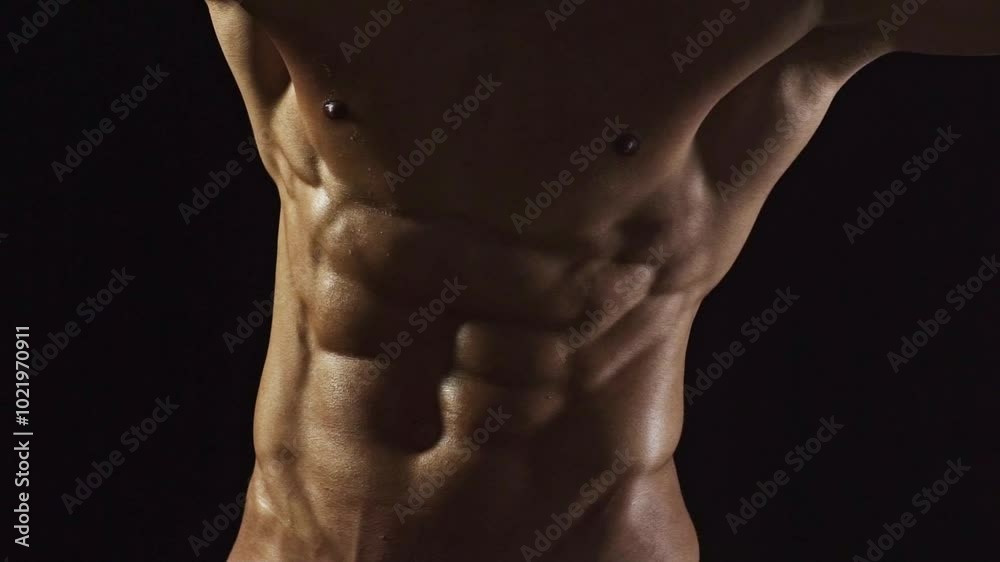 Cropped video of fit man showing six pack abs. Perfect abs, shoulders, and chest. Close up the Abs. Closeup torso. Ab. Muscular torso and ripped abs. Sexy male muscular body. Cropped video of fit man showing six pack abs. Perfect abs, shoulders, and chest. Close up the Abs. Closeup torso. Ab. Muscular torso and ripped abs. Sexy male muscular body.